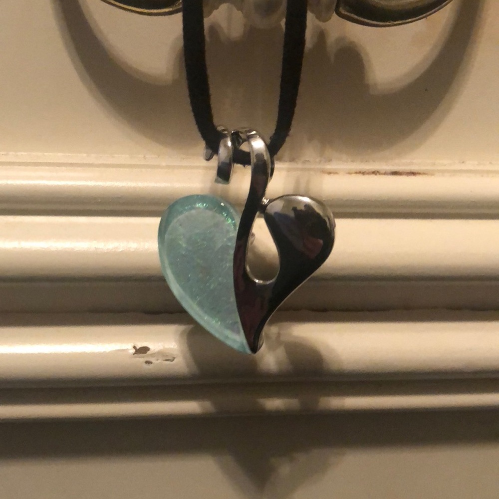 Twisted heart necklace on black chain